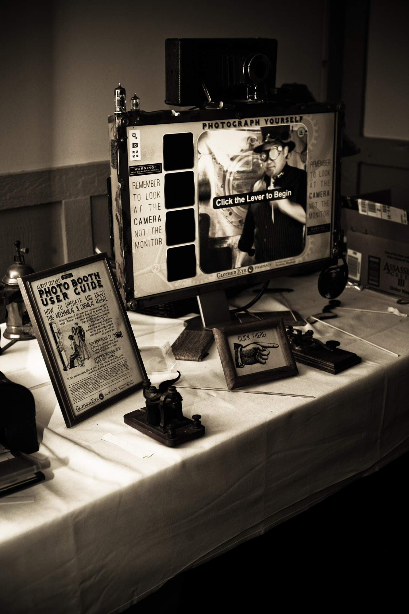 Detail of Photo Booth setup including camera, monitor, and signage